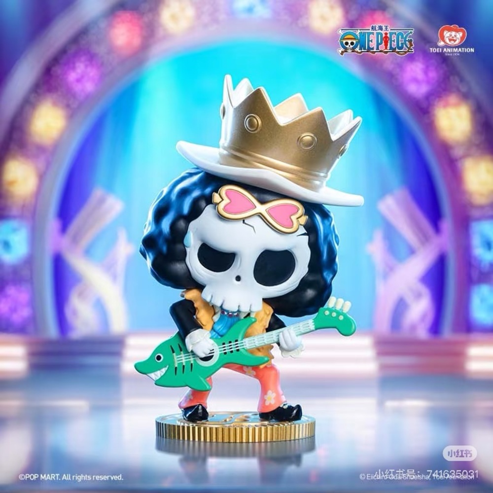 Pop Mart Skull Action Figure with Gold Crown and Green Guitar